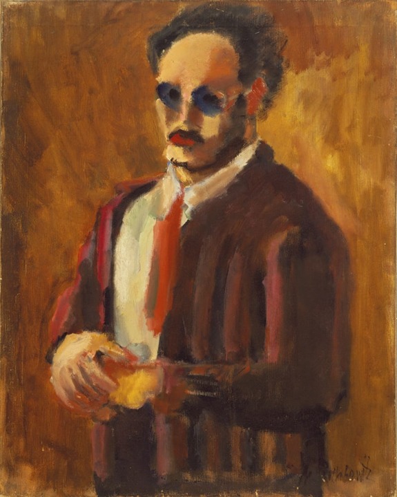 Man with mustache and sunglasses in brown suit and red tie, holding an object, on a warm-toned abstract background.