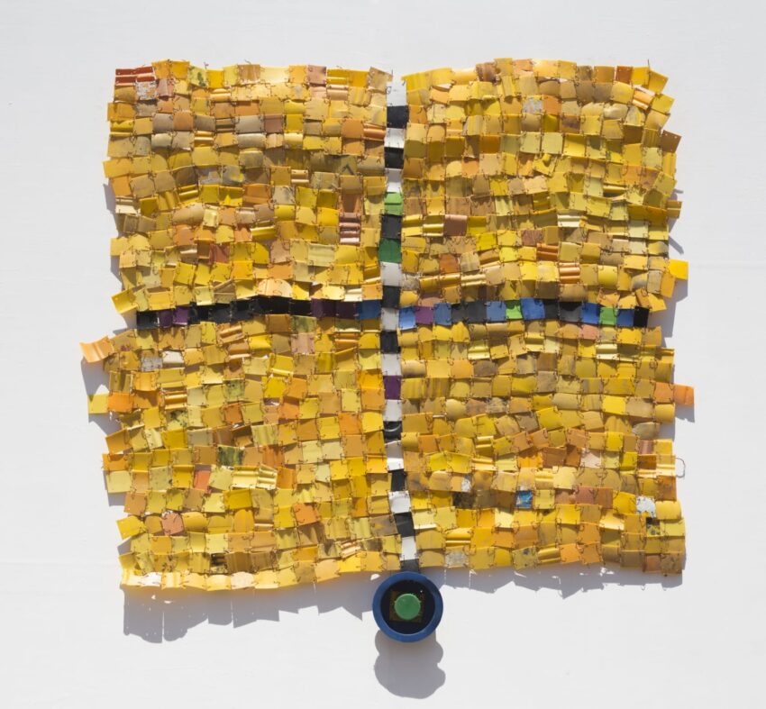 Abstract art piece with a mosaic of small yellow squares, black vertical and horizontal lines, and a green circle at the bottom.