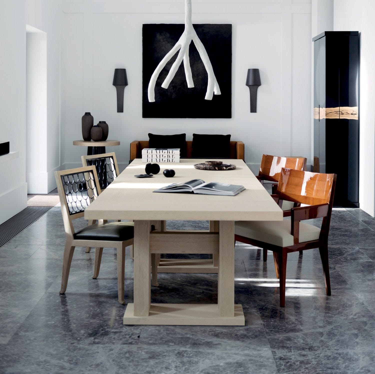 Liaigre designed a tree-like ceramic chandelier as a collaboration with Nymphenburg, the famous porcelain company, for his showroom in Munich, Germany. Each limb may be ordered to suit the dimensions of any room.