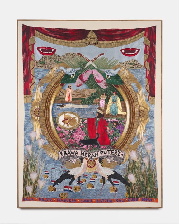 Artistic tapestry featuring a central scene surrounded by floral and animal motifs, with a banner reading "Bawa Merah Puteri."