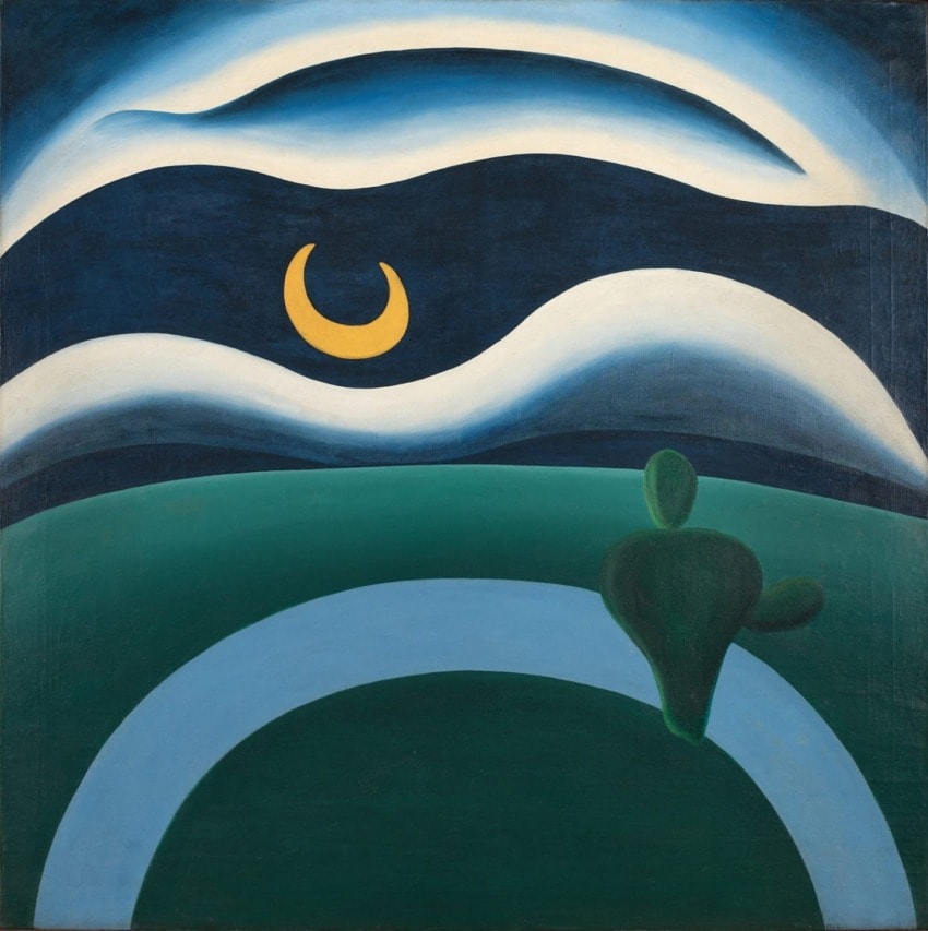 Abstract painting with a crescent moon, swirling clouds, hills, and a dark green cactus set against a blue night sky.