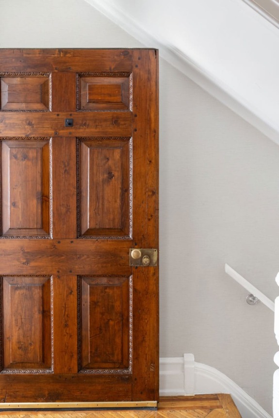Original details—like oversized doors—remain.