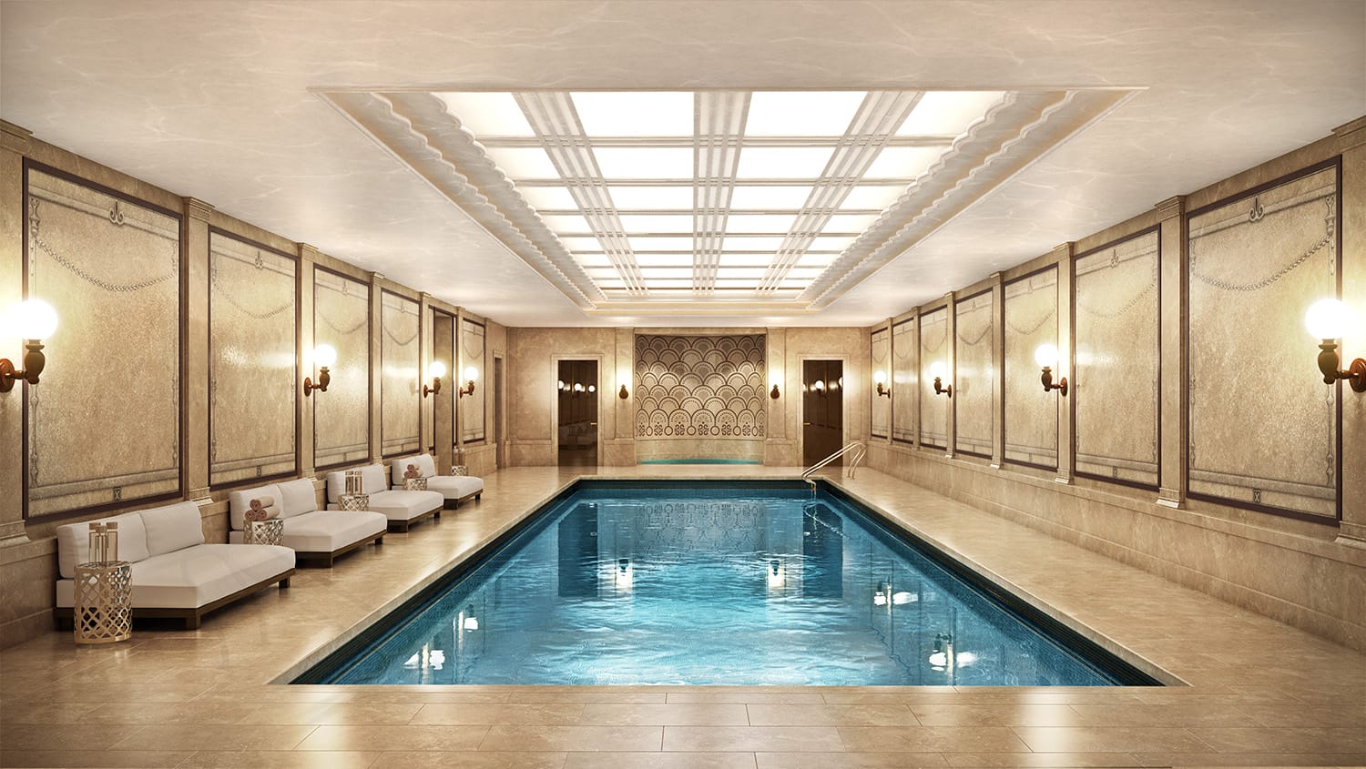 Luxurious indoor swimming pool with elegant lighting, decorative walls, and comfortable lounge chairs along the sides.