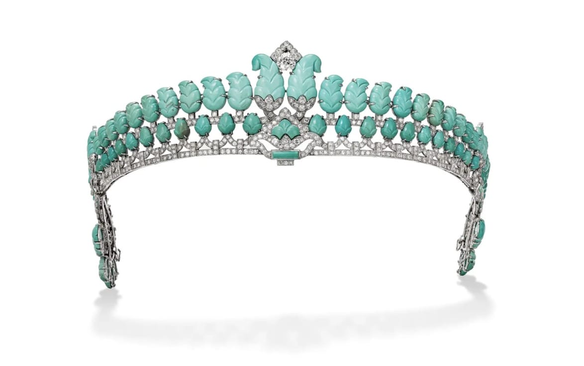 Elegant turquoise and diamond tiara featuring intricate detailing, displayed against a white background.