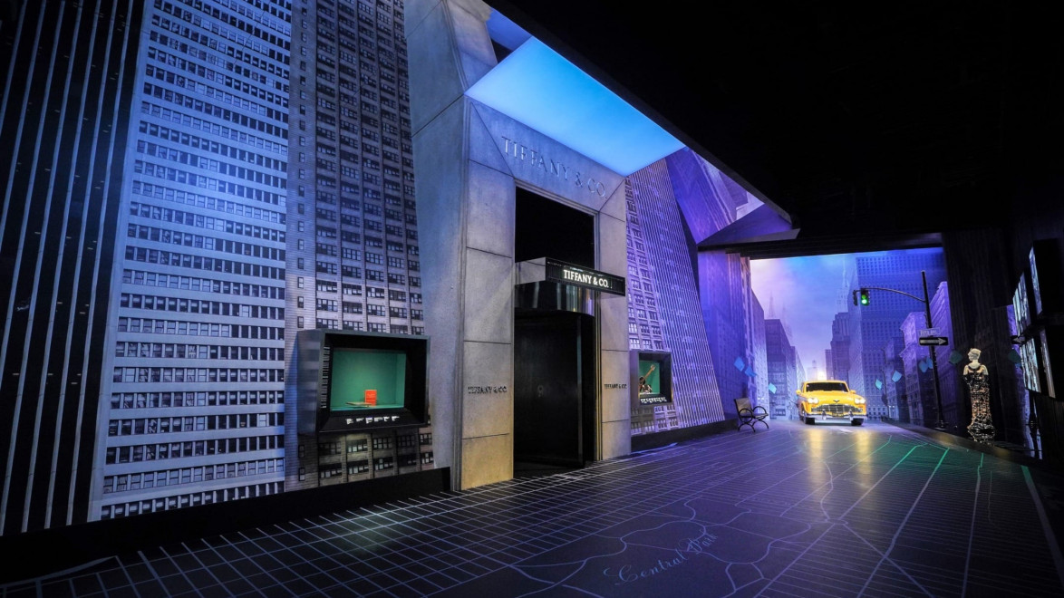 Futuristic urban scene with skyscrapers, neon lights, and a yellow taxi cab in a dimly lit setting.