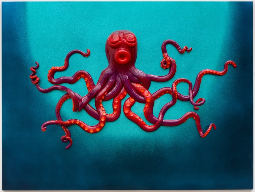 Colorful octopus artwork on a vibrant blue background with swirling tentacles extending in various directions.