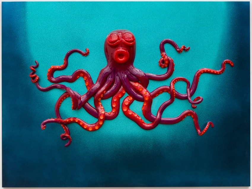 Colorful octopus artwork on a vibrant blue background with swirling tentacles extending in various directions.