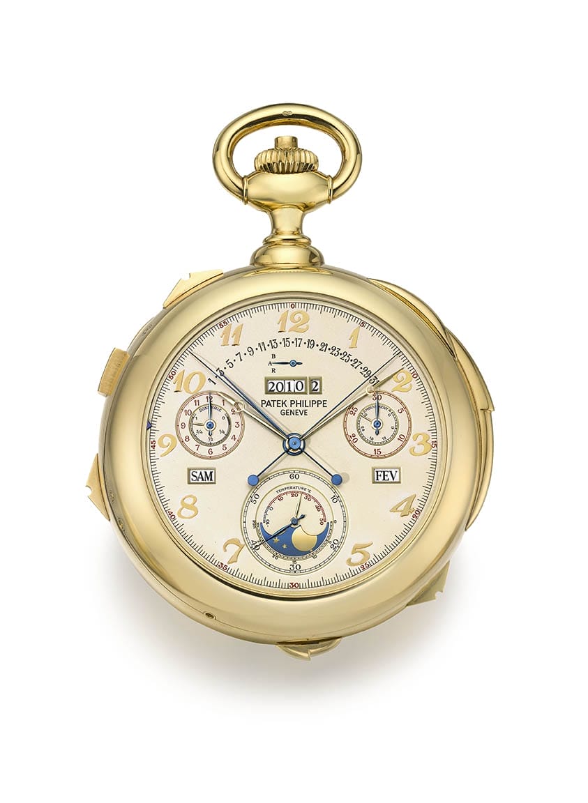 Gold Patek Philippe pocket watch with complex dials and moon phase display on a white background.