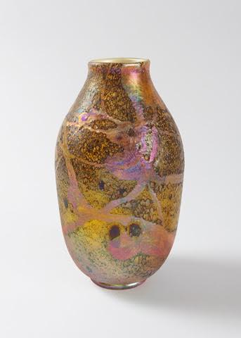 Colorful iridescent vase with abstract design on white background.