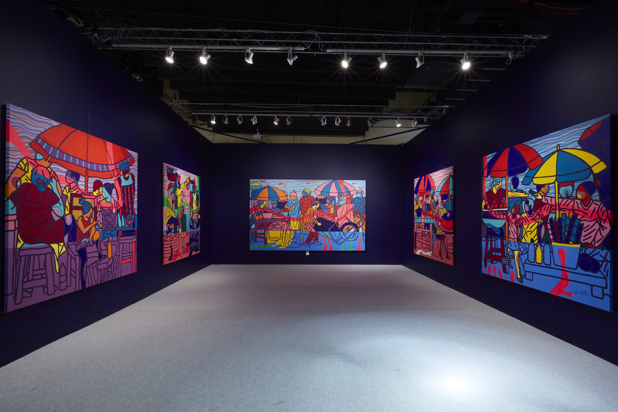 Colorful abstract paintings displayed in a dimly lit gallery, spotlight highlighting vibrant hues and intricate patterns.