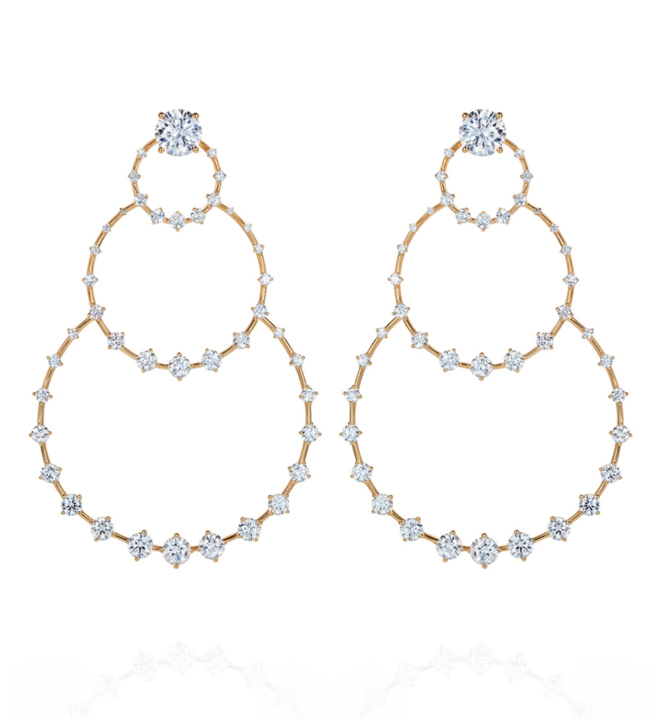 Gold hoop earrings with sparkling diamond accents in a tiered design against a white background.