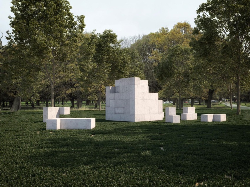 Modern white sculpture surrounded by green trees and grass in a park setting on a clear day.