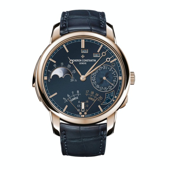 Luxury wristwatch with a blue dial, gold case, moon phase, and various subdials, featuring a black leather strap.