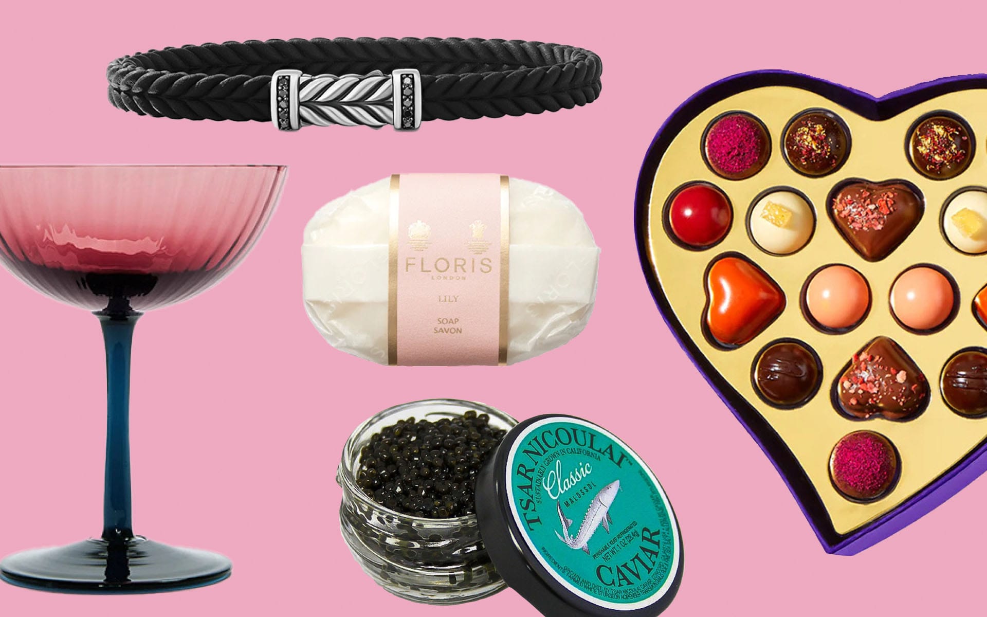 Eclectic selection of luxury gifts: bracelet, wine glass, soap, caviar, and heart-shaped chocolates on a pink background.