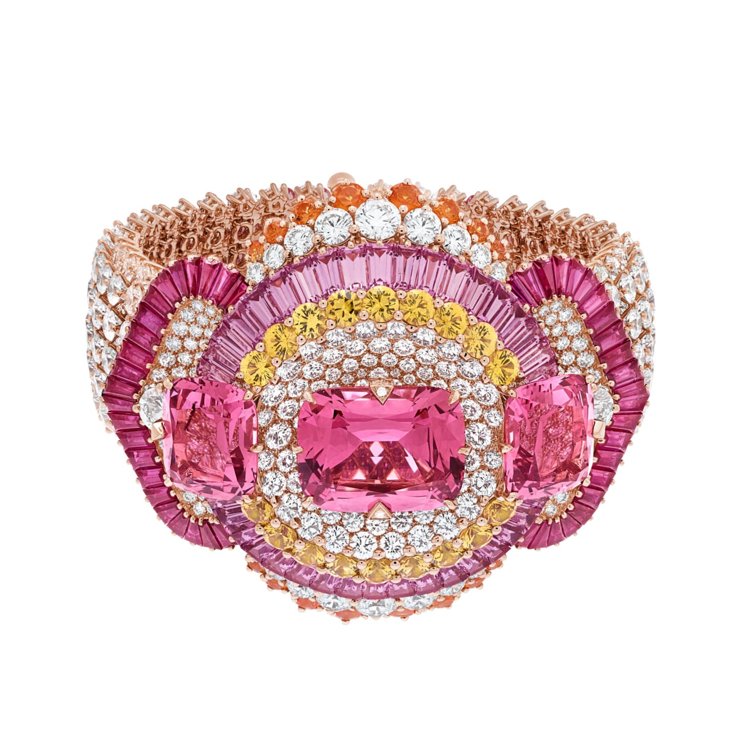 Intricate pink gemstone bracelet adorned with diamonds, yellow and orange gems, set in a detailed gold design.