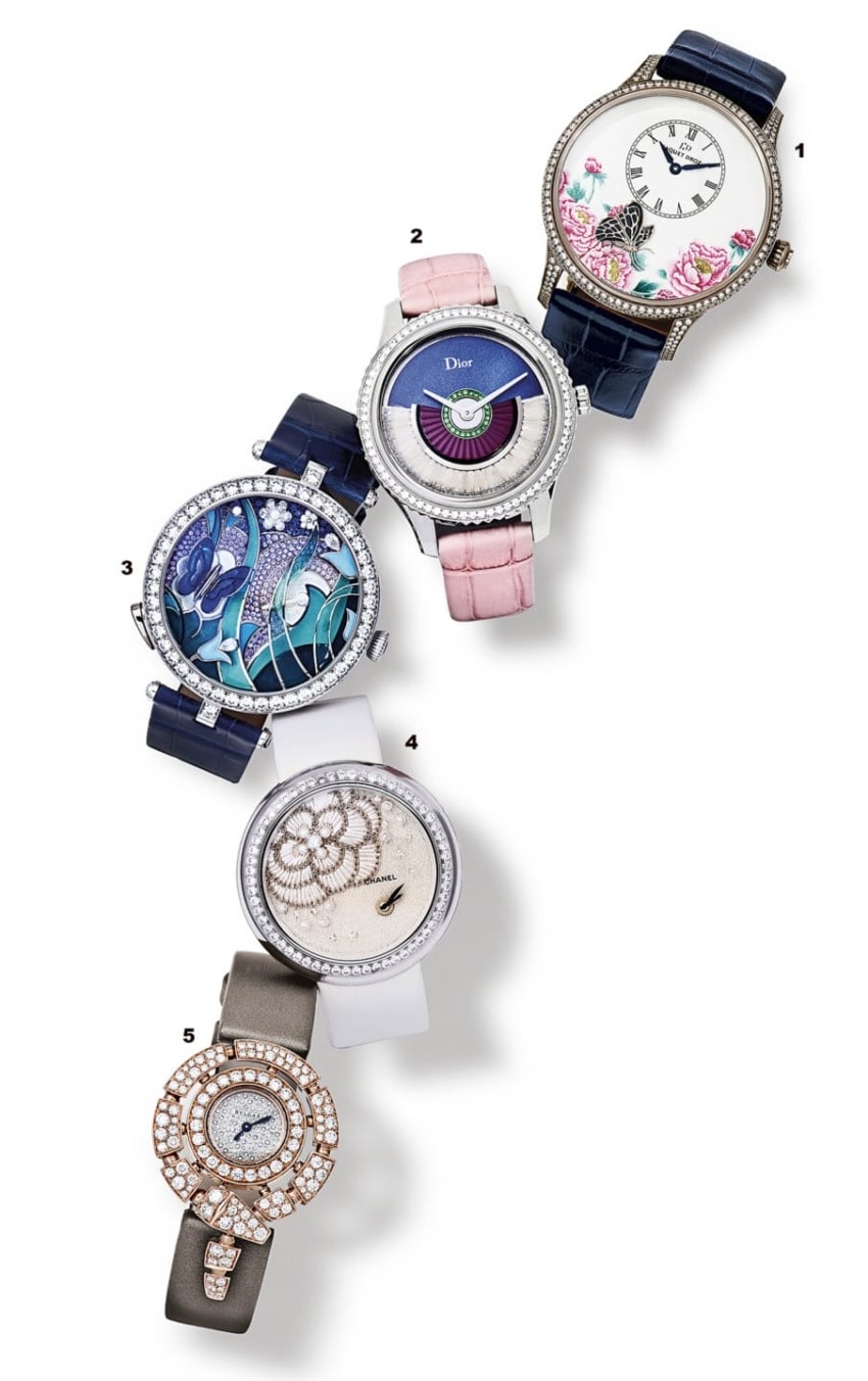 Five elegant watches with intricate, artistic dials and various strap colors displayed on a white background.