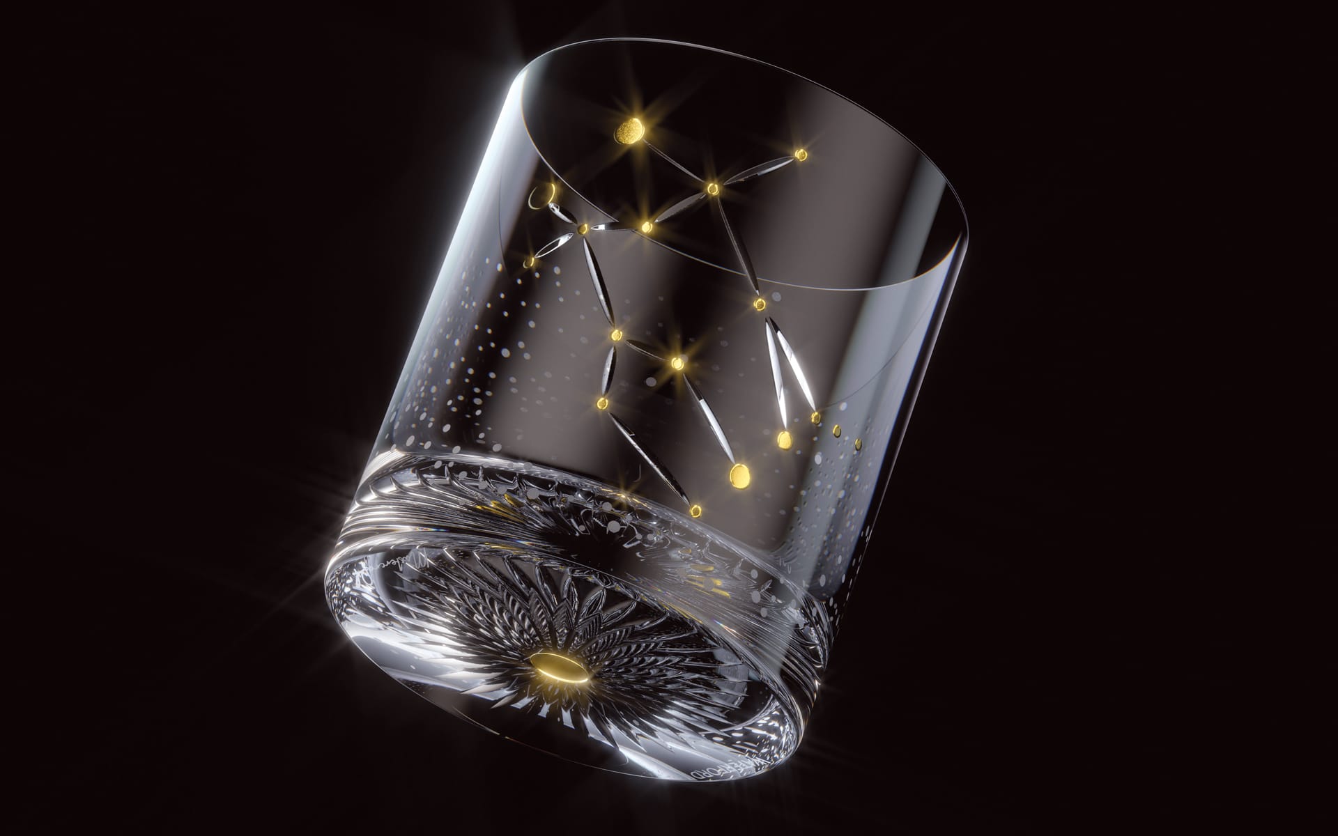 Crystal glass with etched constellation design and gold accents on a dark background.