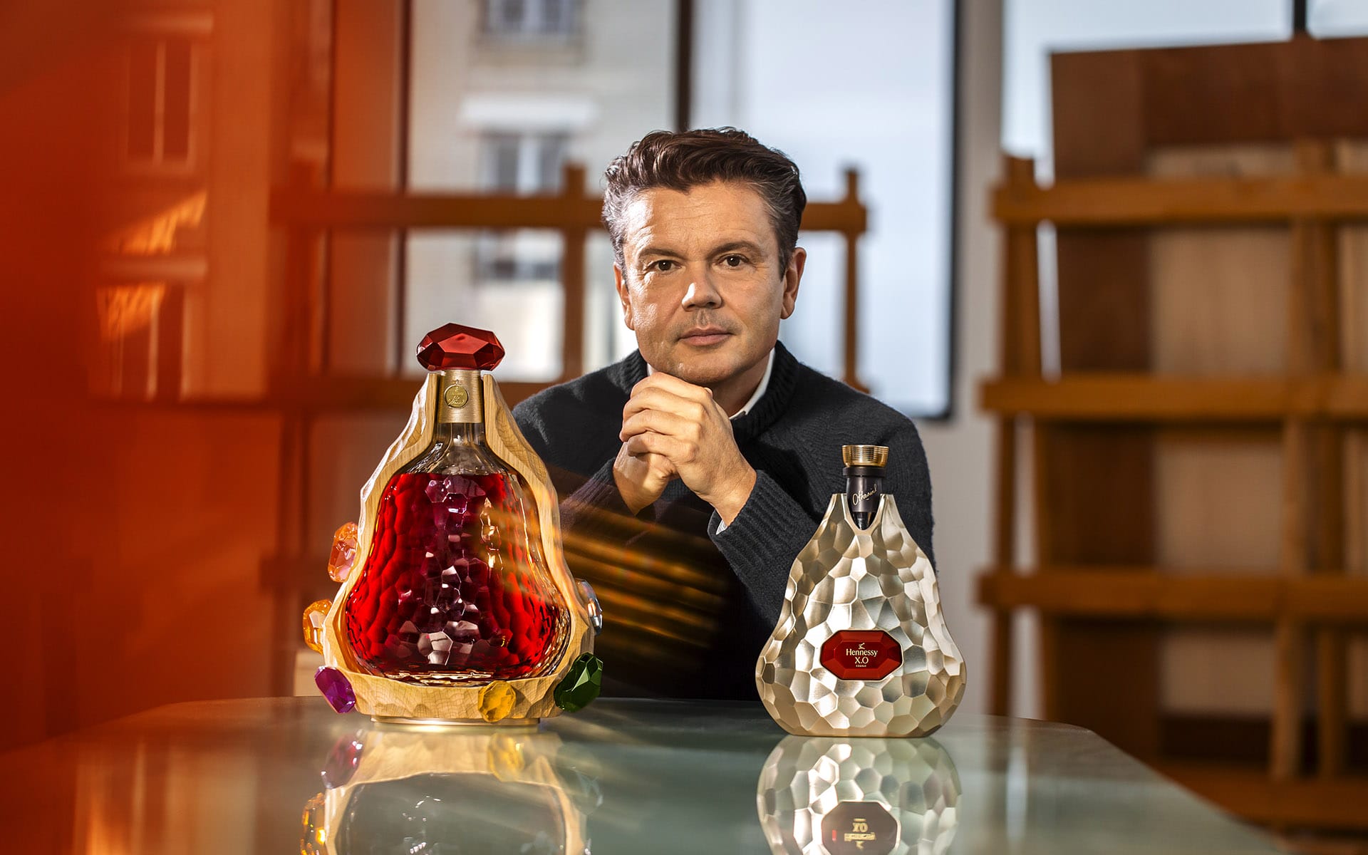 Jean-Michel Othoniel with his creations for Hennessy.
