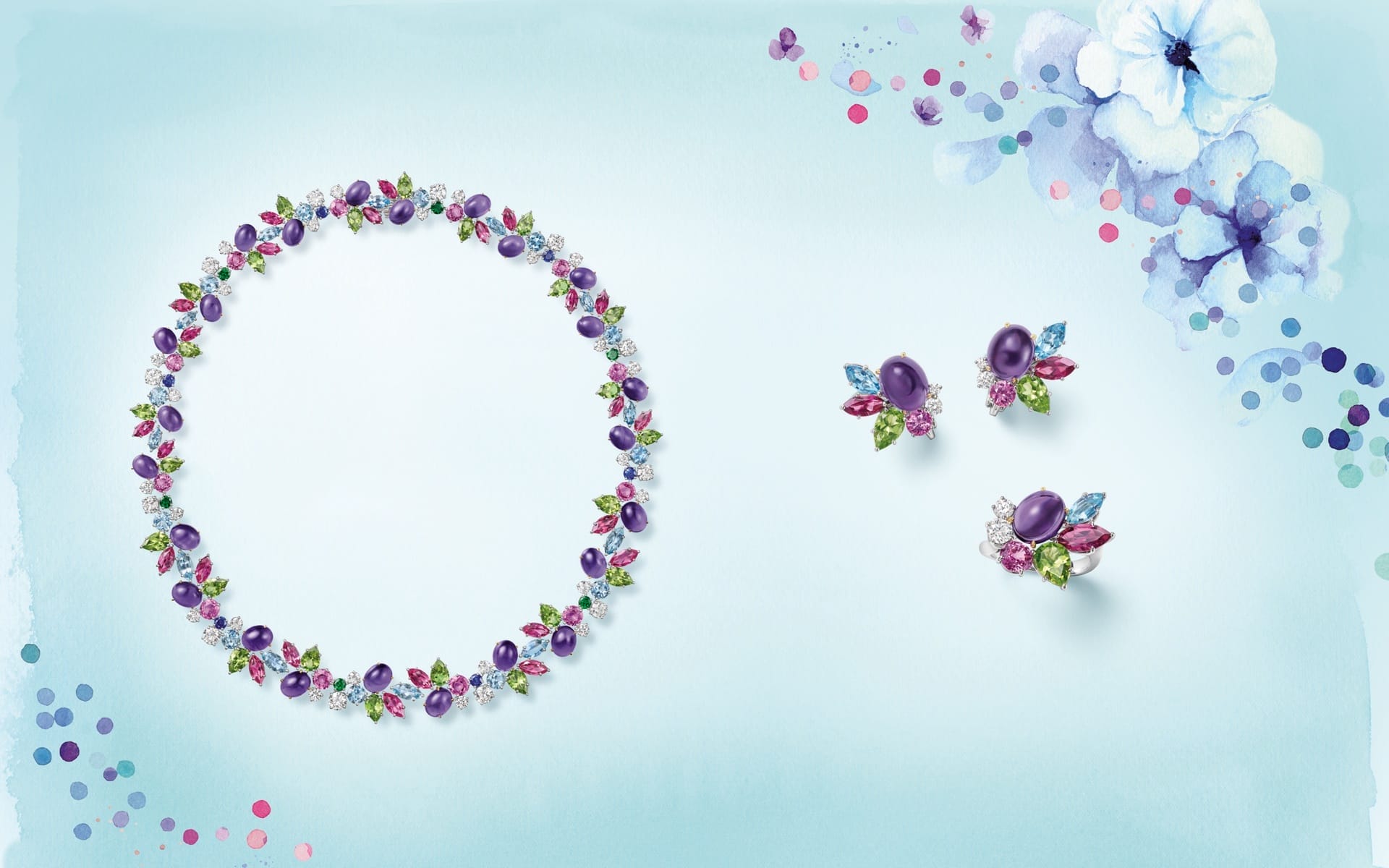 Colorful gemstone necklace and earrings on a blue floral background.