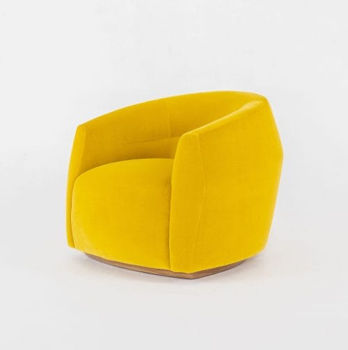 Bright yellow modern swivel chair with plush upholstery on a wooden base, set against a white background.