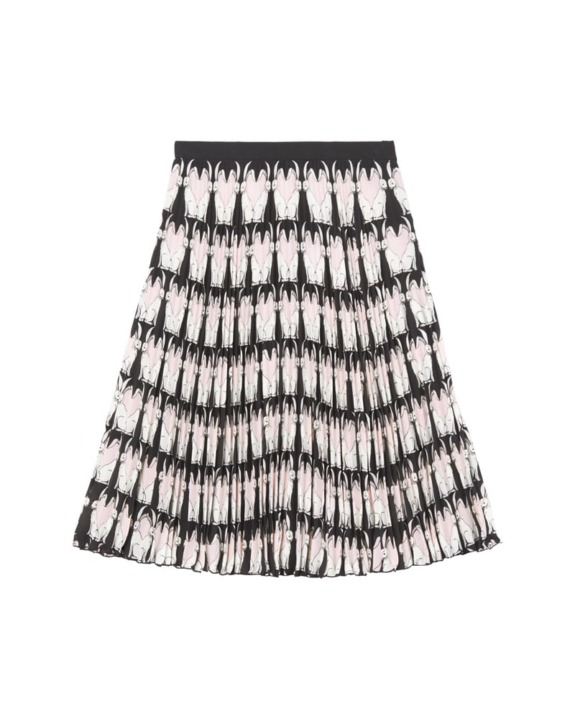 Pleated skirt with a black waistband featuring a repeating pattern of white and pink abstract designs.