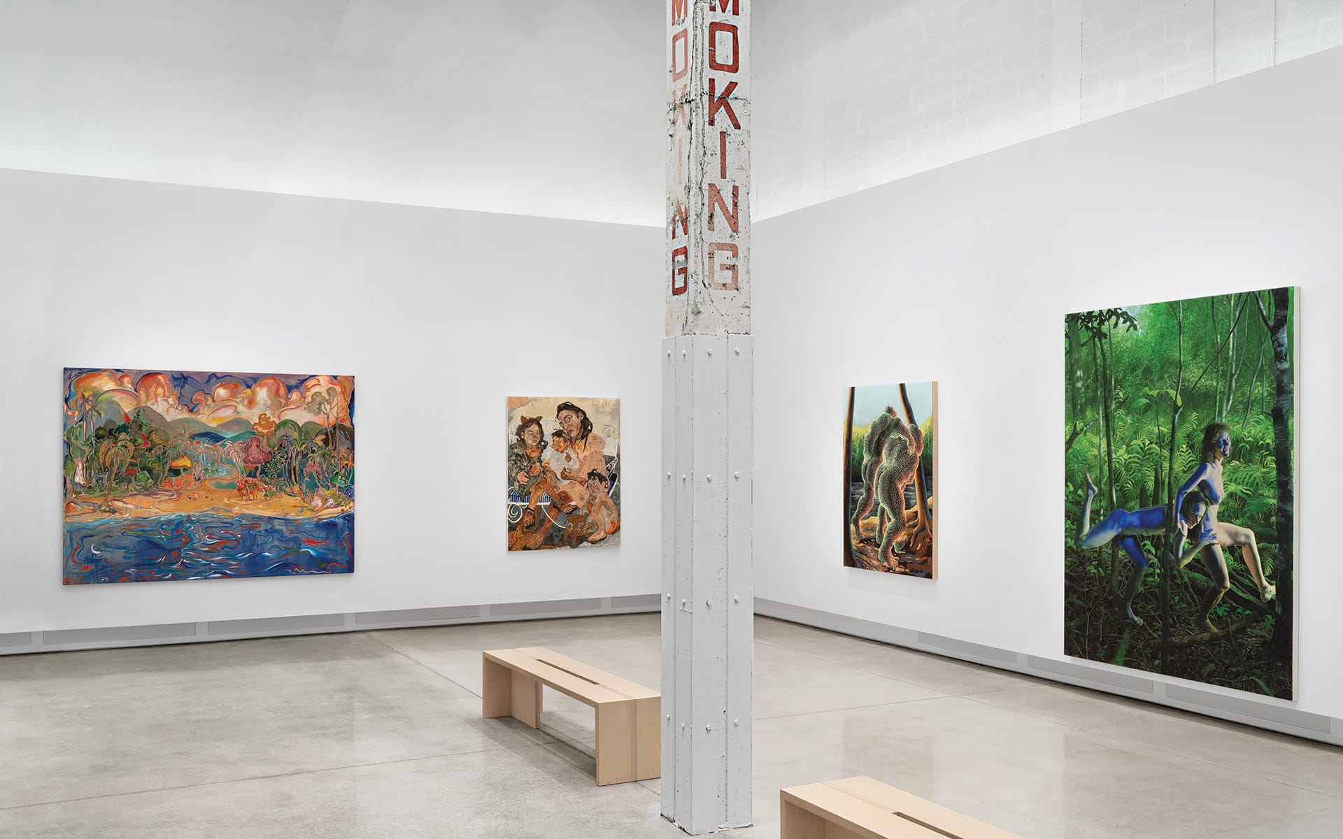 Contemporary art gallery with colorful paintings, featuring benches and a central column with "NO SMOKING" signage.