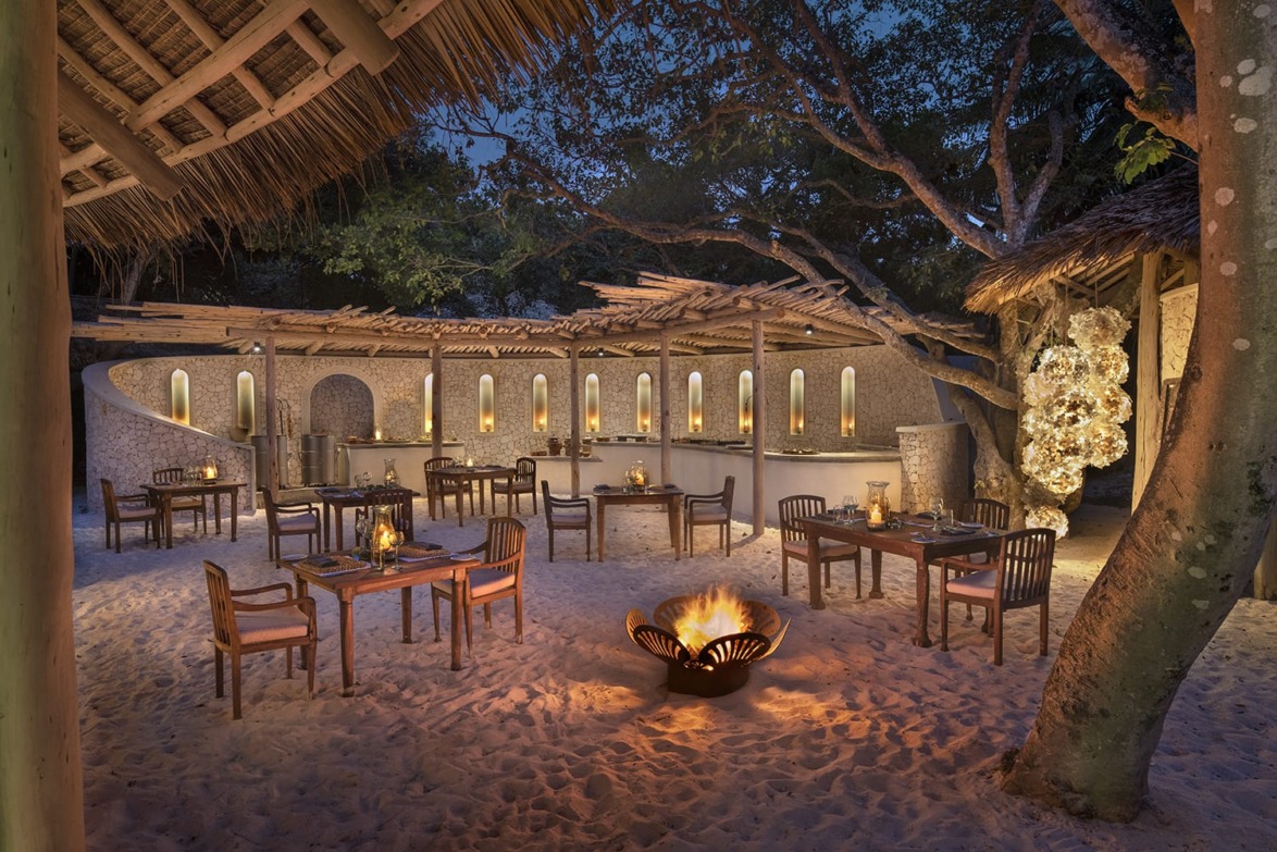 Outdoor dining area at andBeyond Mnemba Island in Zanzibar.