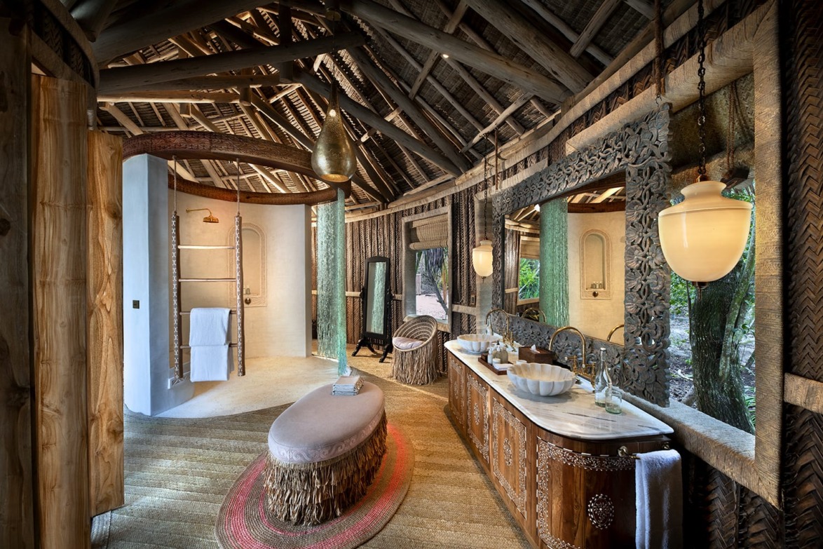 Fox Browne Creative designed the baths at andBeyond Mnemba Island using organic materials and locally sourced furnishings.