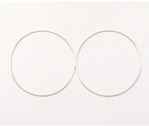 Two overlapping thin, transparent circles on a plain white background.