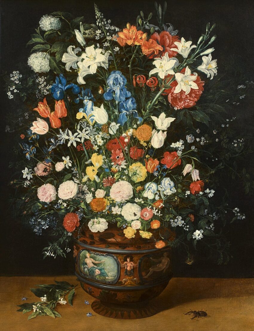 A vibrant floral still life in a decorative vase with various colorful flowers against a dark background.
