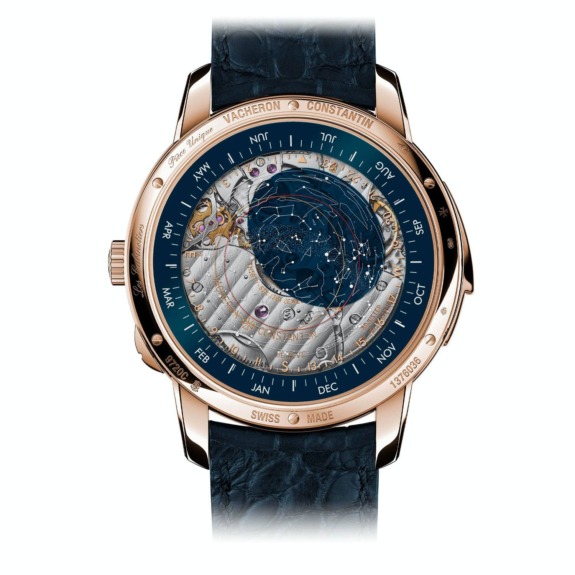 Luxury wristwatch with celestial map and gold detailing on a textured blue and silver dial, featuring month indicators.