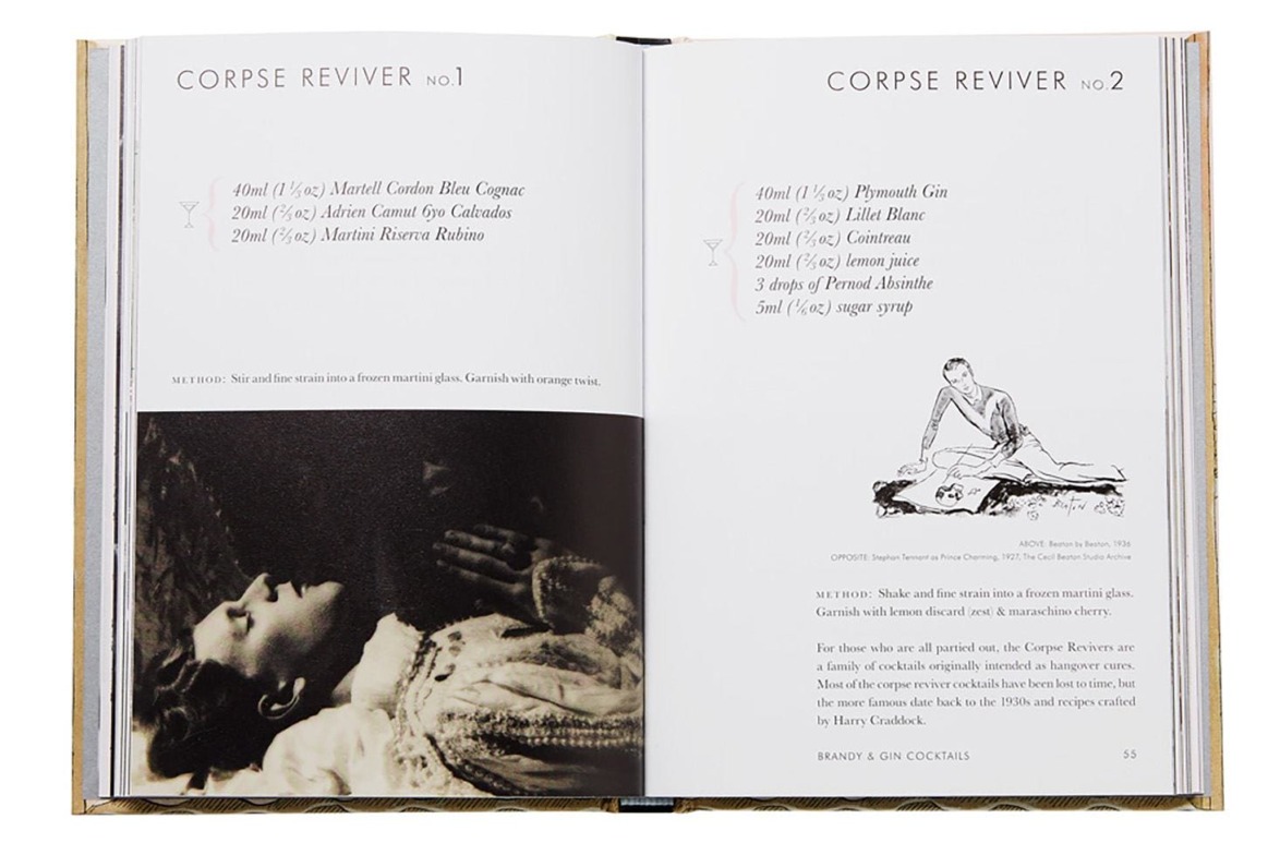 Open book showing recipes for Corpse Reviver cocktails with a vintage photo of a person lying down on the left page.