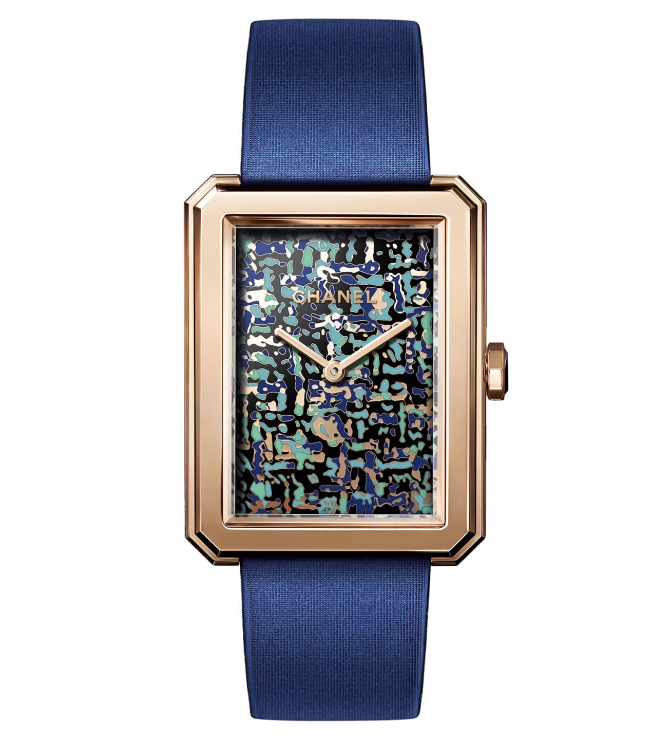 Luxury watch with a gold rectangular case, abstract blue patterned dial, and blue strap.