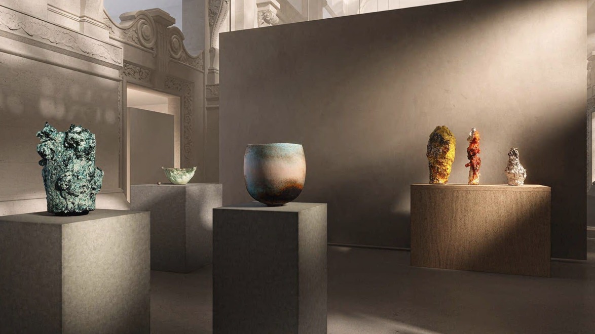 Contemporary ceramic art pieces displayed on pedestals in a modern gallery setting with elegant architecture.