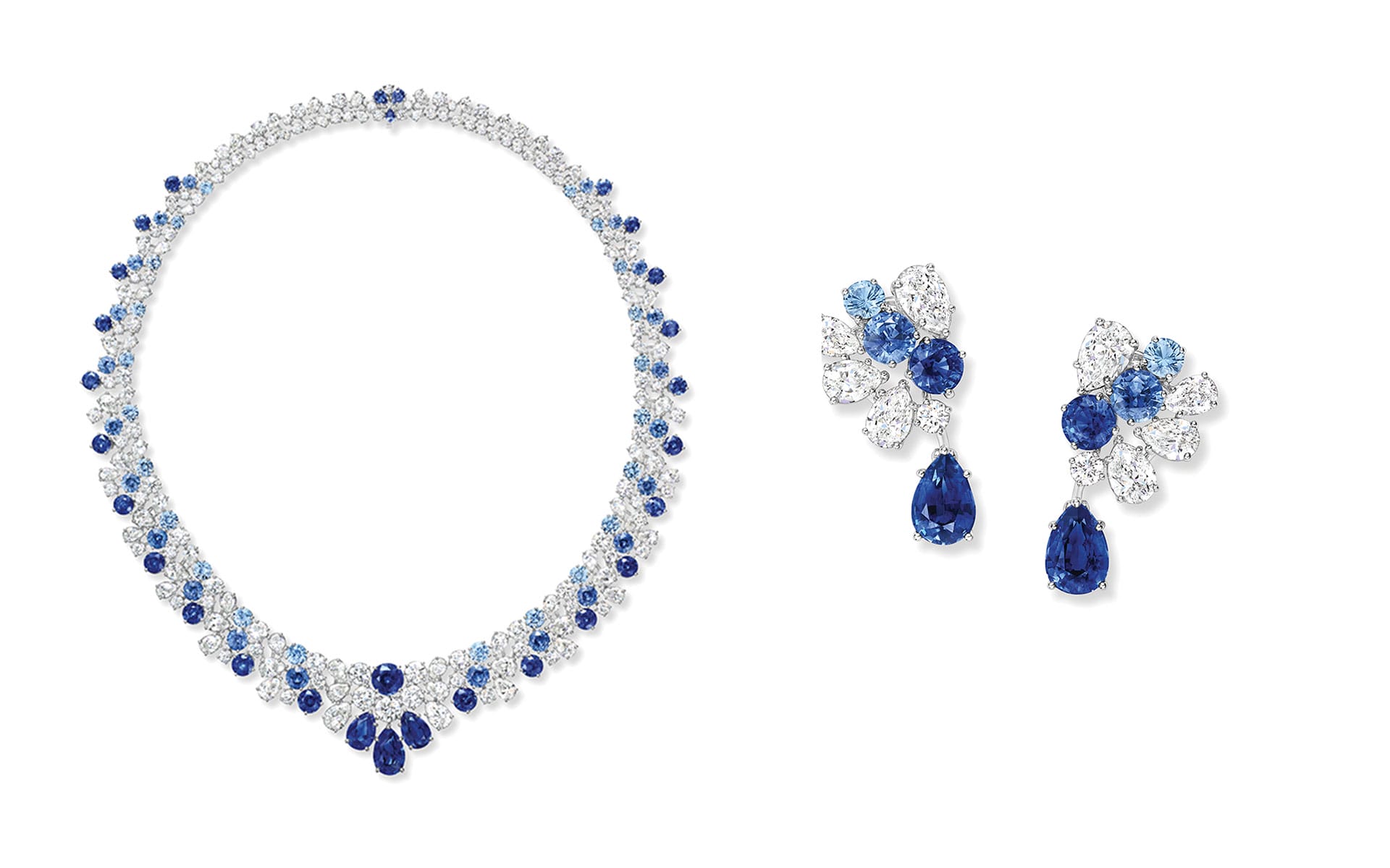 Sapphire and diamond St. Moritz earrings and necklace from the Majestic Escapes collection by Harry Winston.
