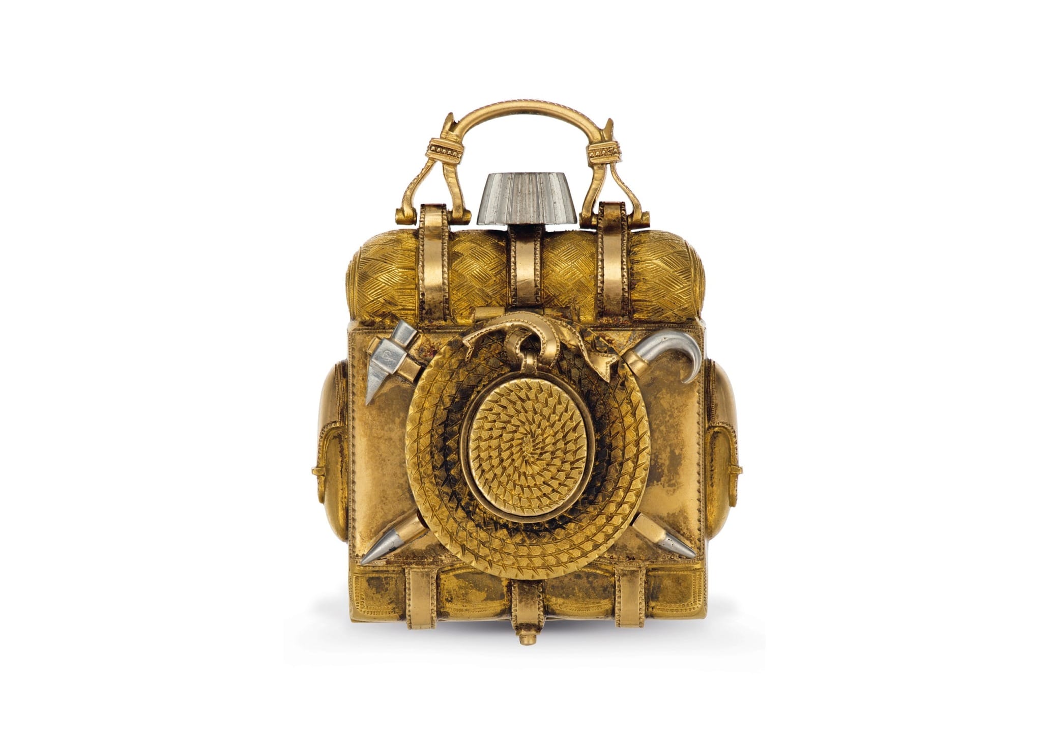 Ornate antique gold container with intricate patterns and a circular decorative element on the front.