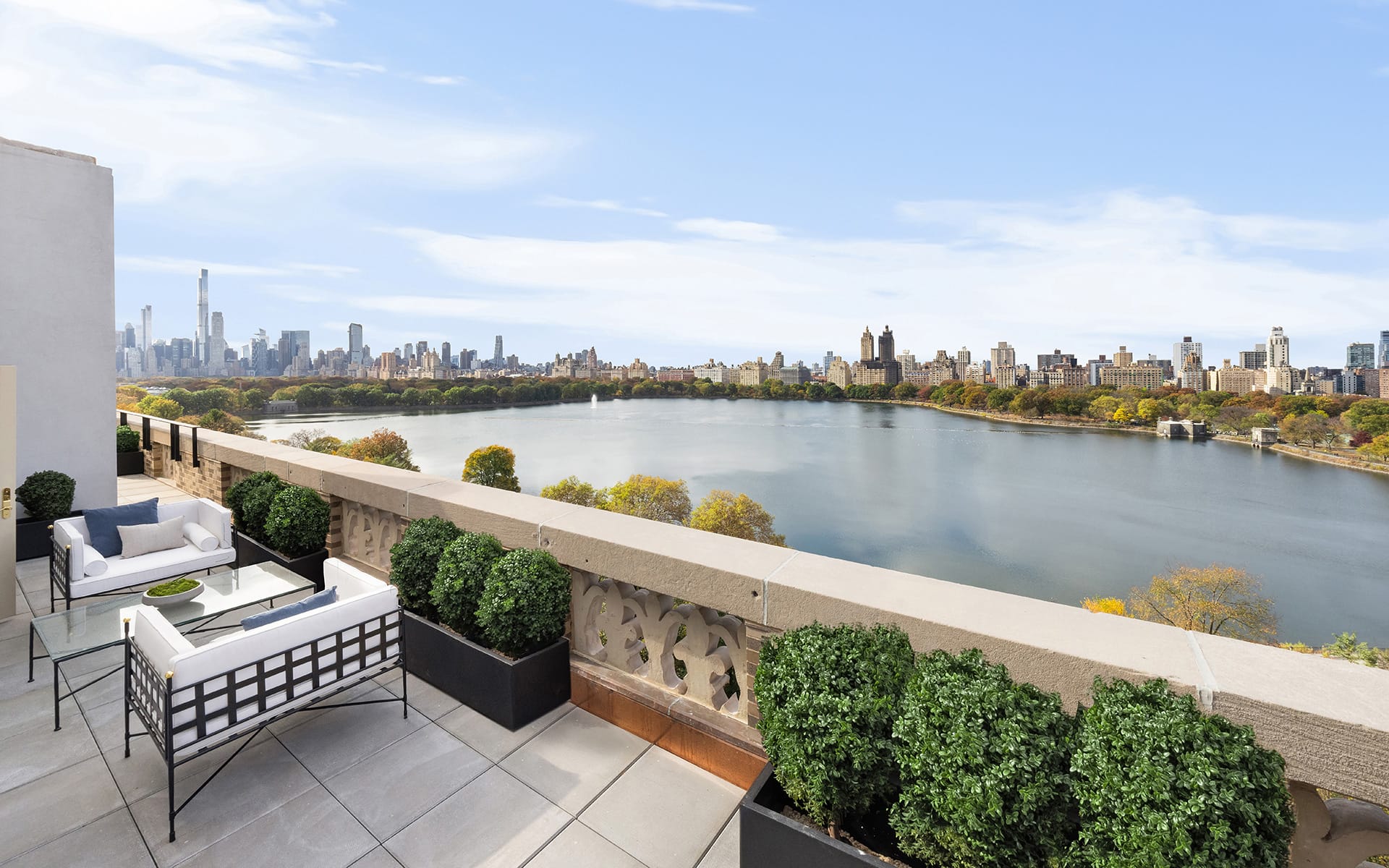 The penthouse offers views of scenic views of both the Jacqueline Kennedy Onassis Reservoir and Central Park
