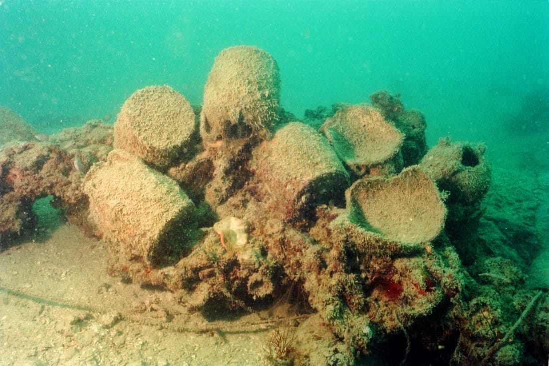 Changsha ewers trapped in a coral concretion on the top of the wreck mound