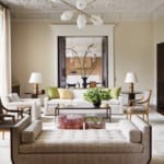 A chandelier by Régis Botta for Ozone hangs above the sitting area, where Kleinberg designed the sofa and armchair, both covered in a Pierre Frey fabric; the mahogany cocktail table; and the daybed. Joining the mix are pinkish crystal-resin drum tables by Atta and a custom rug by Edward Fields.