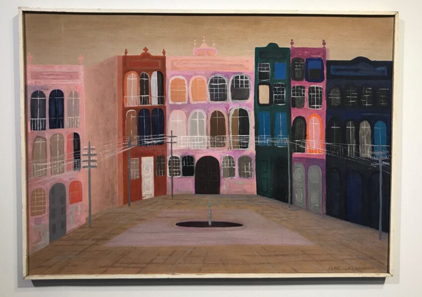 Colorful painting of a town square with vibrant buildings and a fountain in the center, created by an artist.