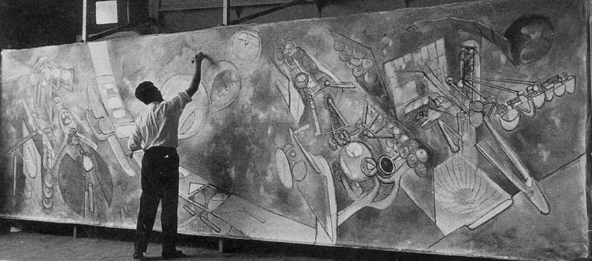 Artist painting surrealistic mural on large canvas with abstract figures and mechanical elements in a studio setting.