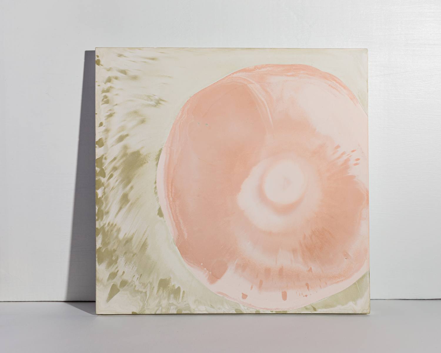Abstract painting with soft pink and beige swirls, set against a plain white background.