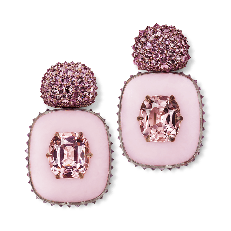 Pink and purple gemstone earrings with studded tops on a plain background.