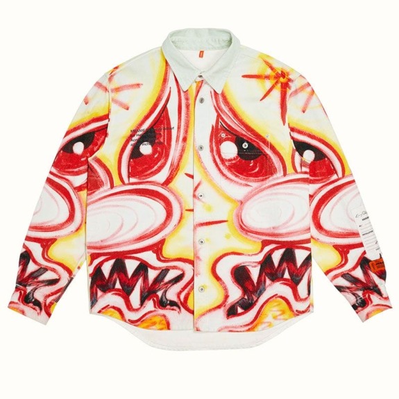 Colorful button-up shirt with abstract red and yellow face design on white background.