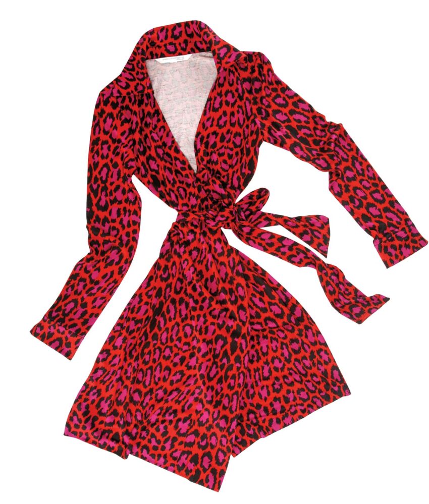 Red and black leopard print wrap dress with long sleeves and tied waist, laid flat on a white background.