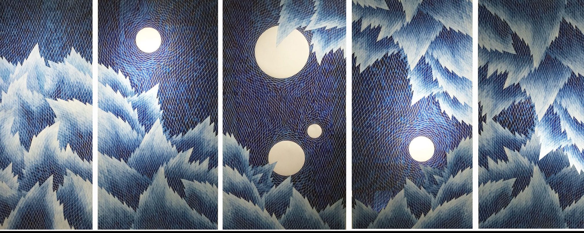 Abstract artwork with blue and white swirling patterns and circular shapes resembling moons or planets.