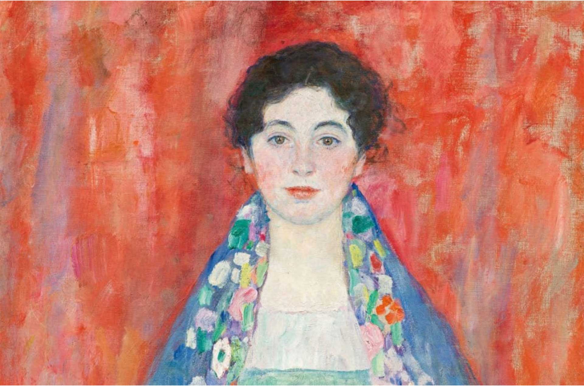 Painting of a woman with dark hair wearing a colorful shawl against a vibrant red background.