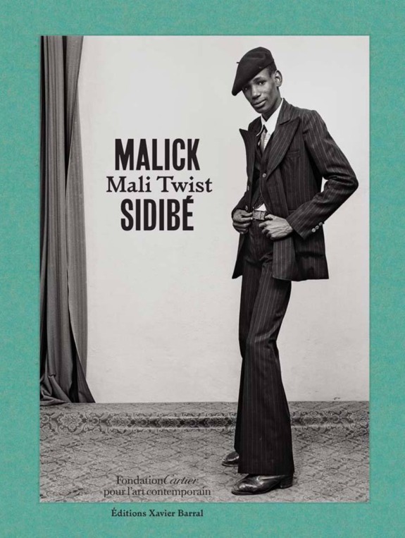 Cover of Malick Sidibé's book "Mali Twist" featuring a stylish man in a pinstripe suit and hat against a teal background.