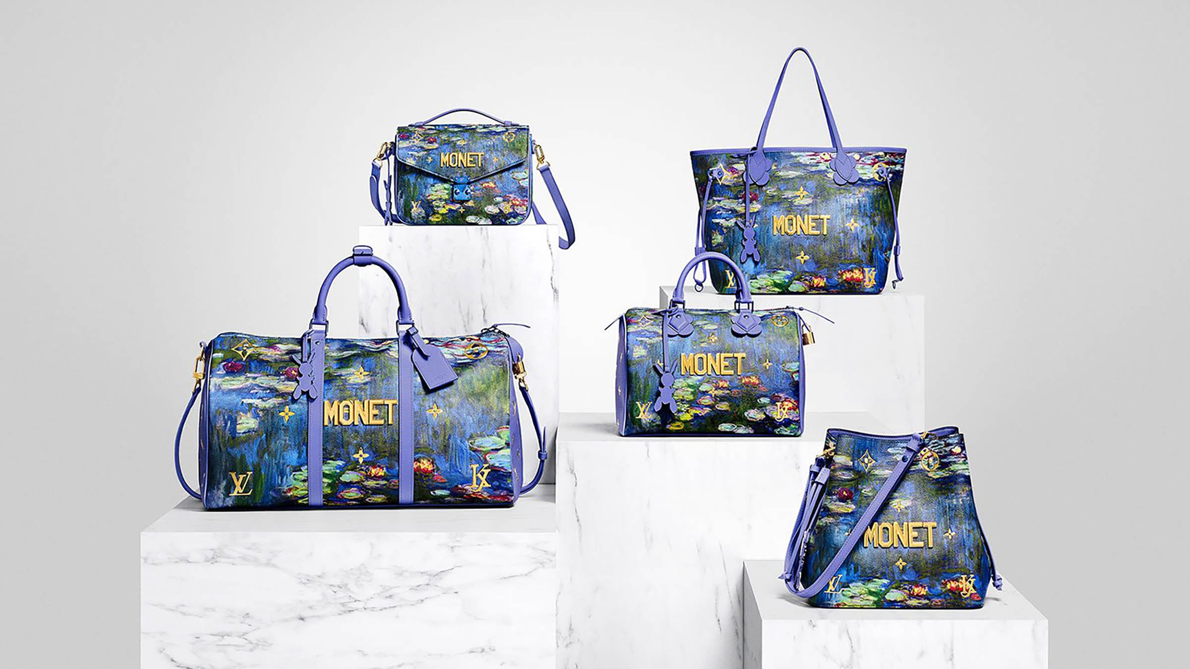 Monet-themed designer handbags displayed on marble pedestals.