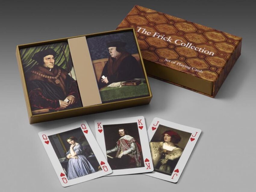Frick Collection playing cards featuring historical portrait designs in an open box display with cards laid out.